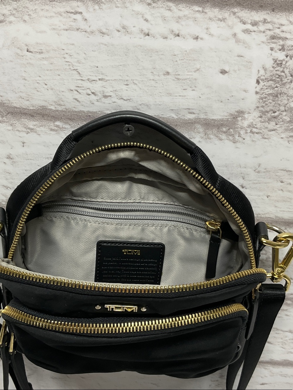 Tumi Black Nylon Crossbody with Gold Hardware Accents - Picture 3 of 9
